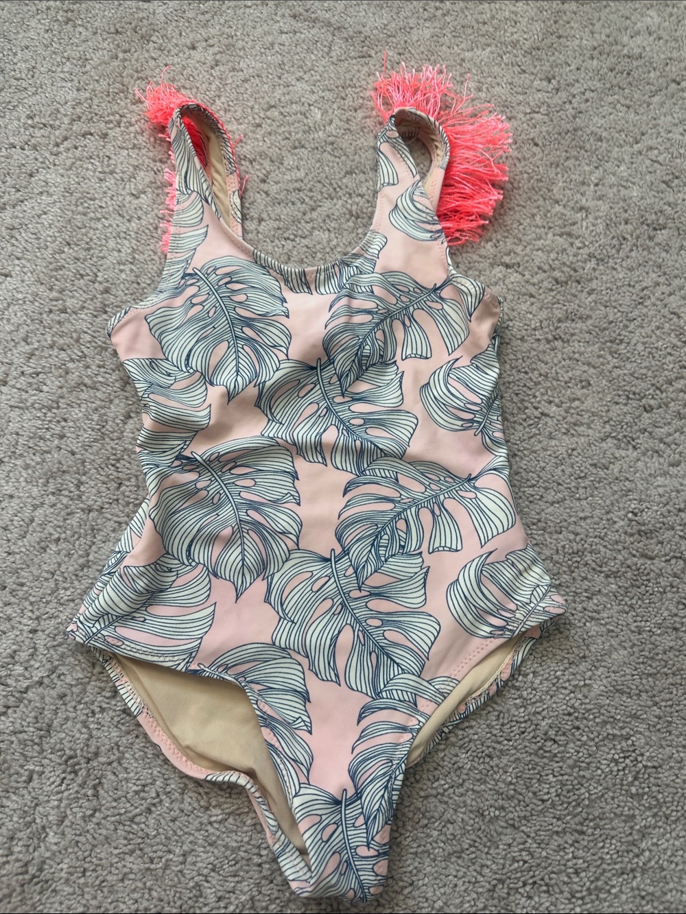 Girls Pink Tropical Leaf One-Piece Swimsuit with Neon Coral Fringe